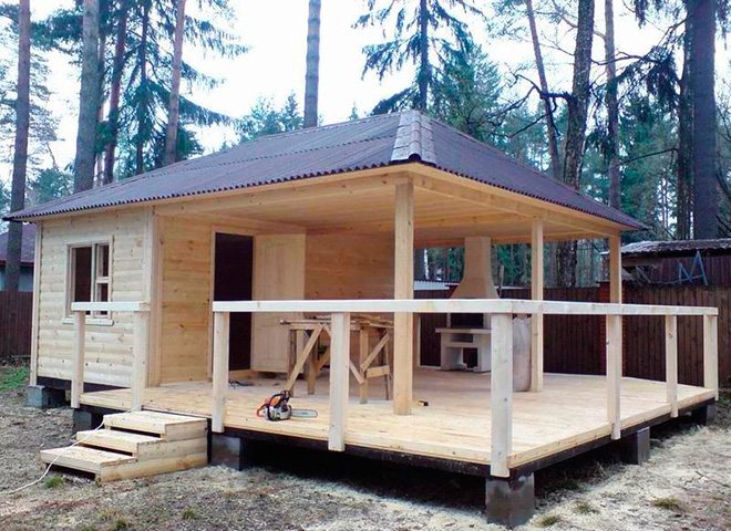 Gazebo with barn and barbecue under one roof