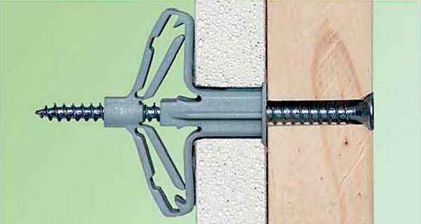 Fastening with a butterfly dowel to drywall